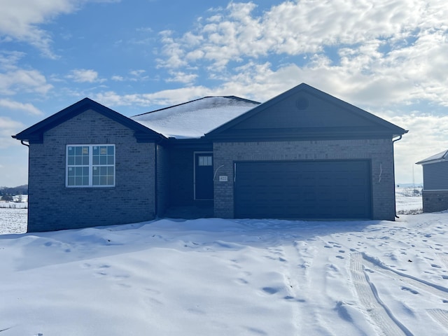 single story home with a garage