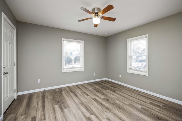 unfurnished bedroom with ceiling fan and light hardwood / wood-style flooring