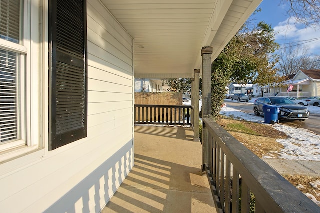 balcony featuring a porch