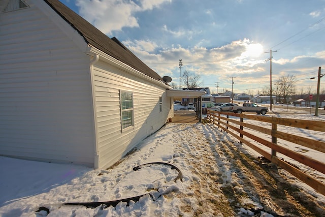 view of yard layered in snow