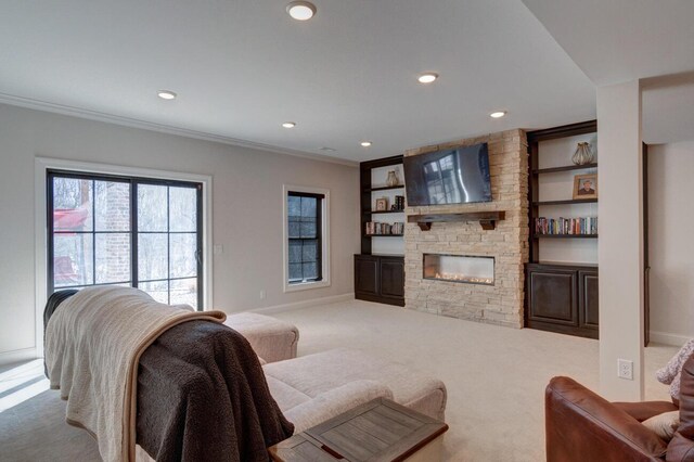 living area featuring recessed lighting, beam ceiling, a ceiling fan, and light wood finished floors