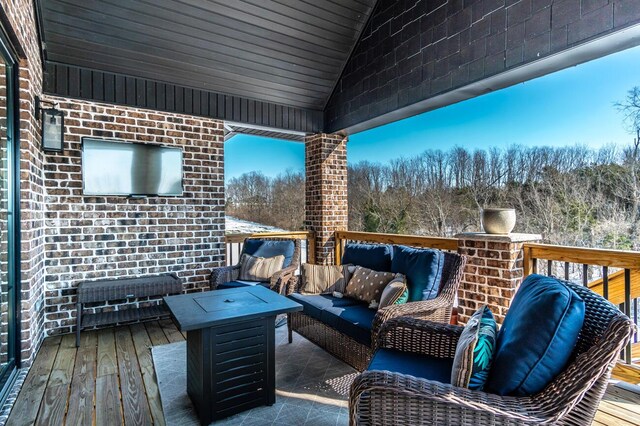 balcony featuring grilling area and an outdoor hangout area