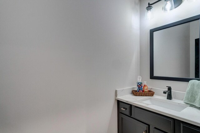 laundry area featuring recessed lighting, washing machine and dryer, cabinet space, and baseboards