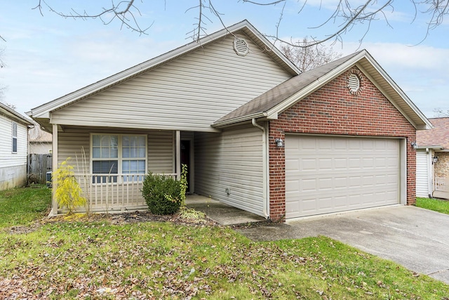 view of front facade featuring a garage and a front lawn