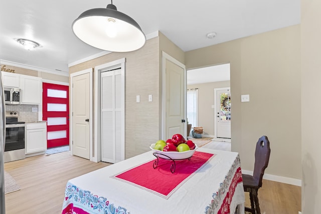 dining area featuring light hardwood / wood-style floors