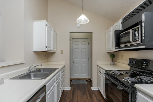 kitchen featuring lofted ceiling, white cabinetry, black range with electric cooktop, sink, and hanging light fixtures