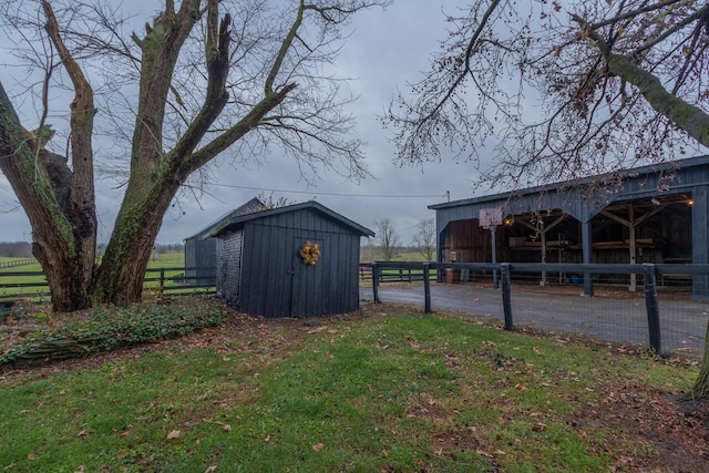 exterior space featuring an outbuilding and a rural view