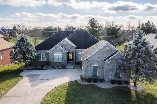 view of front of home with a front lawn