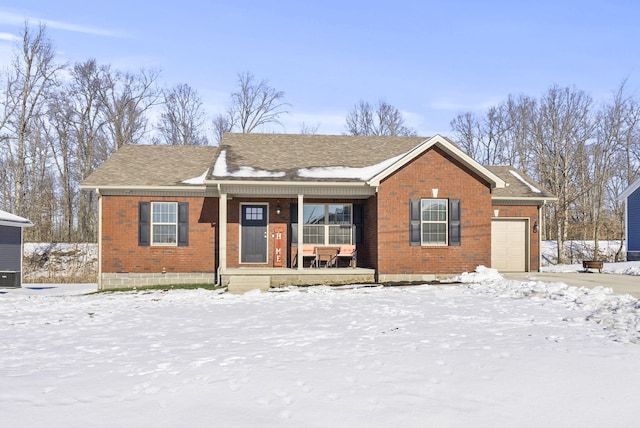 view of front of home with a garage and a porch