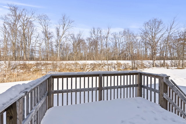 view of snow covered deck