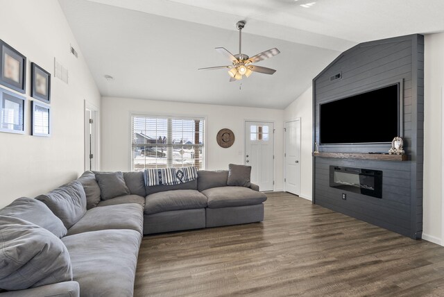 living room with ceiling fan, sink, dark hardwood / wood-style floors, and vaulted ceiling