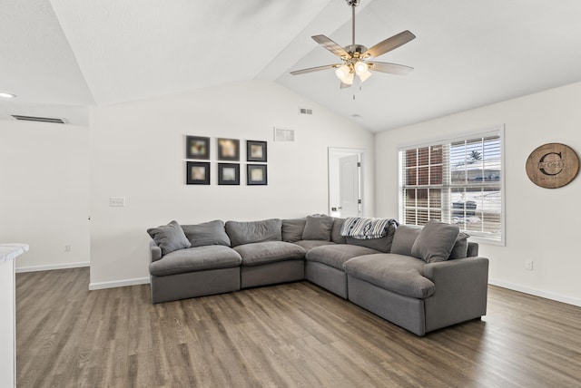 living room with ceiling fan, hardwood / wood-style floors, and lofted ceiling