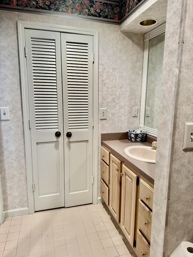 bathroom featuring vanity and tile patterned flooring