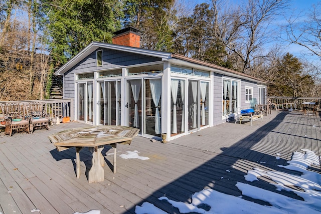 deck featuring a sunroom