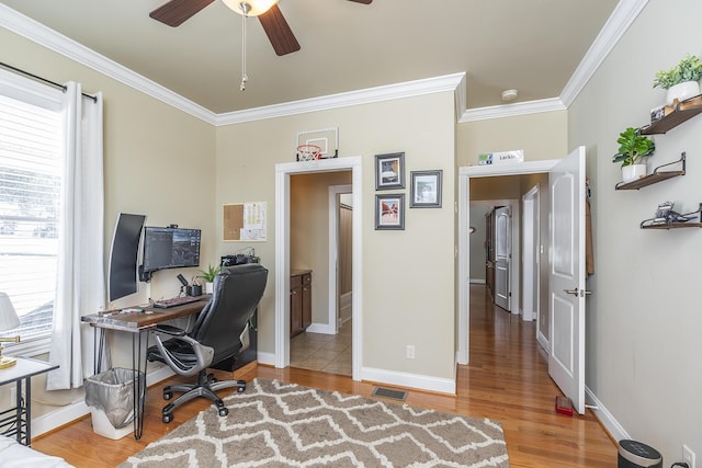 office area featuring hardwood / wood-style flooring, crown molding, and ceiling fan