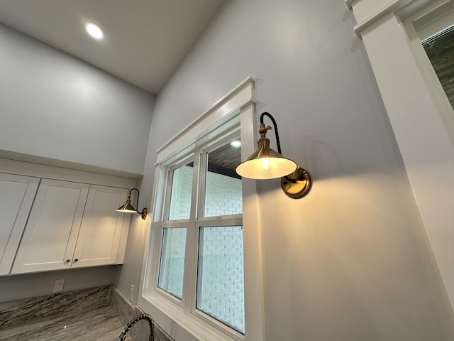 interior details featuring white cabinetry