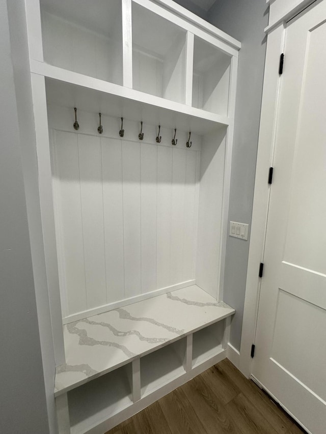 mudroom with dark hardwood / wood-style flooring