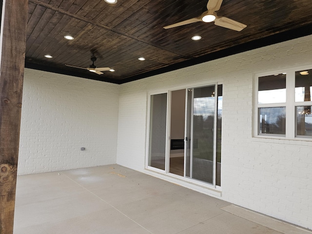 view of patio featuring ceiling fan