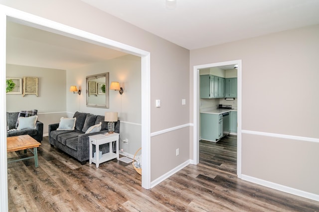 living room featuring dark wood-type flooring