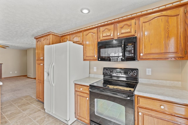 kitchen with ceiling fan, light carpet, a textured ceiling, and black appliances