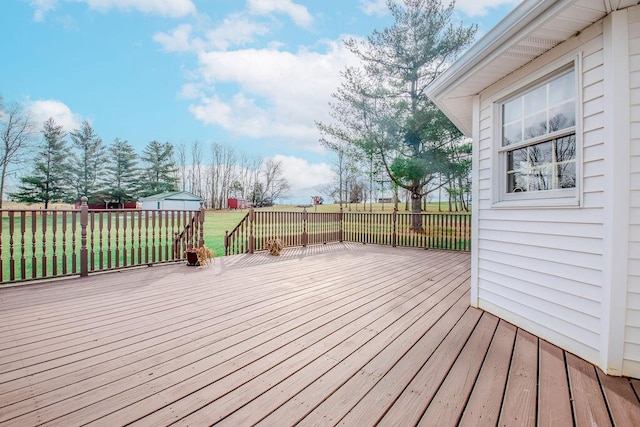 wooden deck with a yard