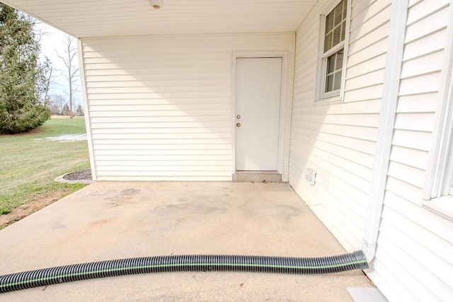 doorway to property featuring a patio