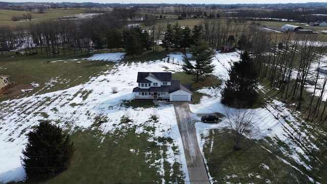 snowy aerial view with a rural view