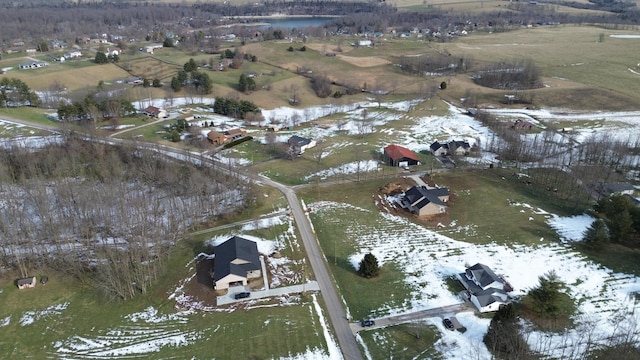 snowy aerial view with a rural view