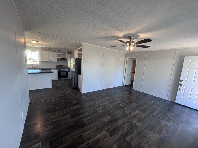 walk in closet with dark wood-style floors and electric panel