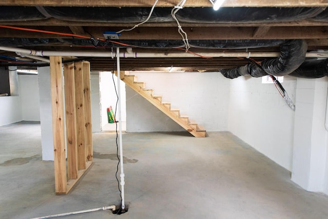 basement featuring stairway