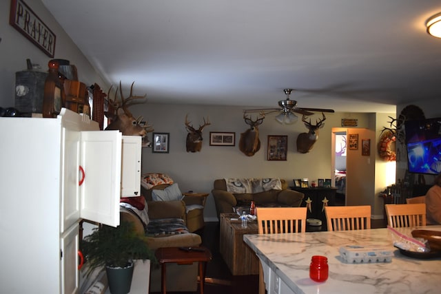 dining area with ceiling fan