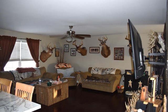 living room featuring ceiling fan