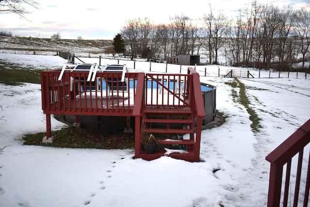 view of snow covered deck