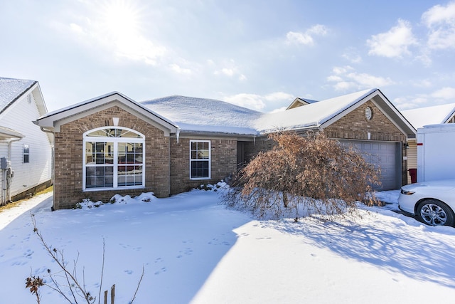 ranch-style house featuring a garage