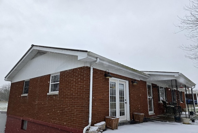 view of snow covered property