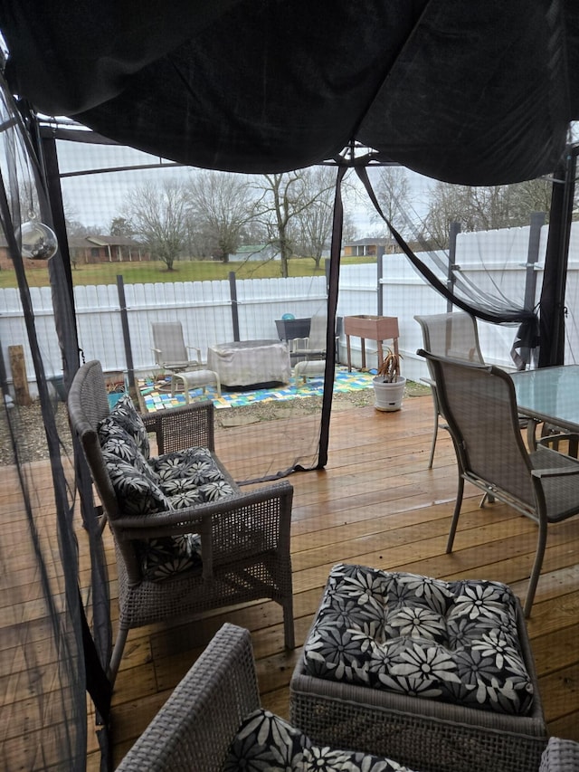 wooden deck with an outdoor hangout area