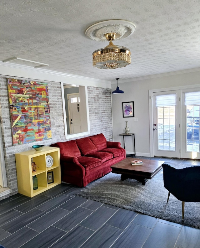 living room with crown molding and a textured ceiling