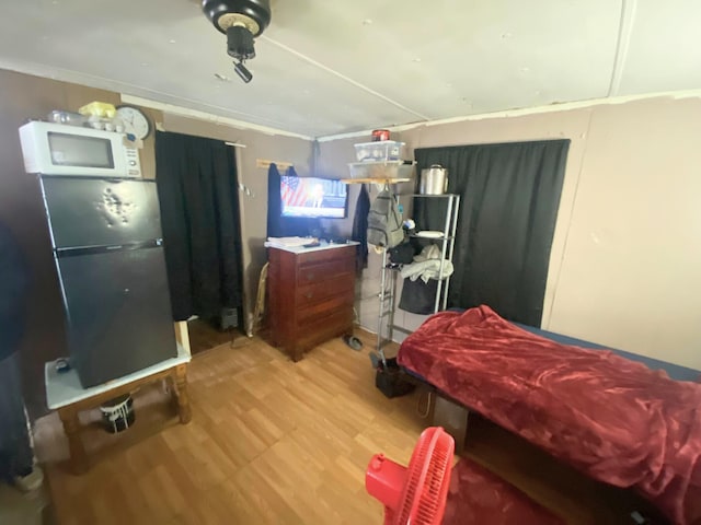 bedroom featuring hardwood / wood-style flooring