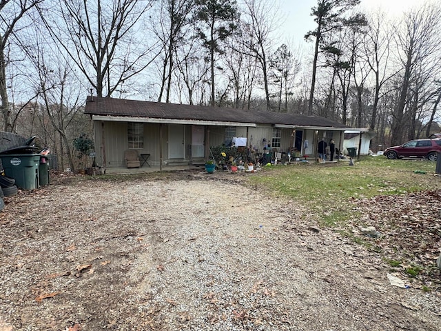 ranch-style home featuring covered porch