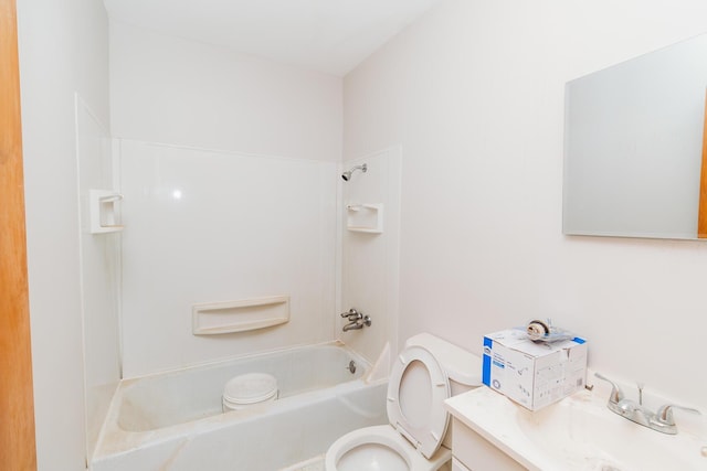 full bathroom featuring vanity, tub / shower combination, and toilet