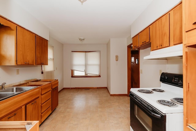 kitchen featuring electric stove and sink