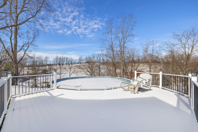 view of snow covered deck