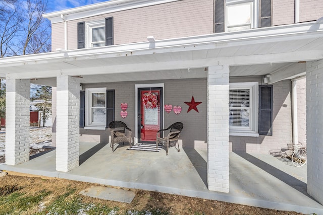 property entrance with a porch