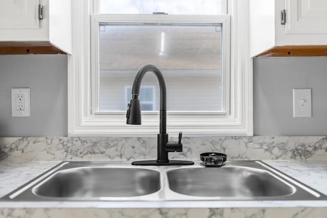 details with sink and white cabinets