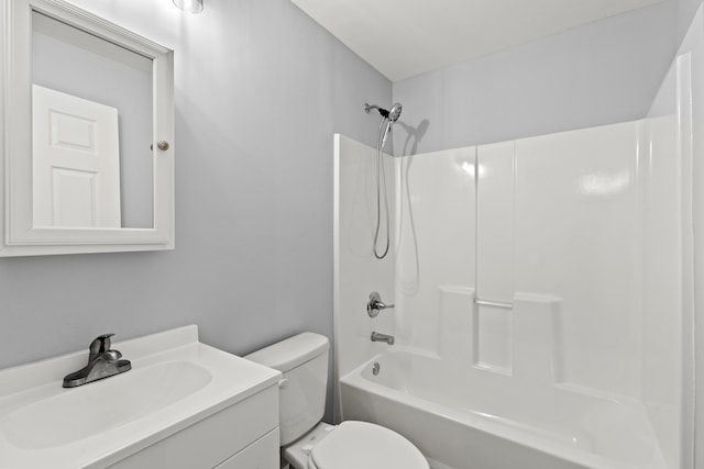 full bathroom featuring toilet, shower / bath combination, and vanity