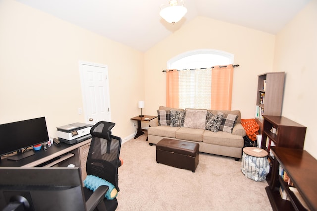 carpeted living room with lofted ceiling