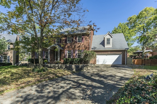 colonial-style house with a garage