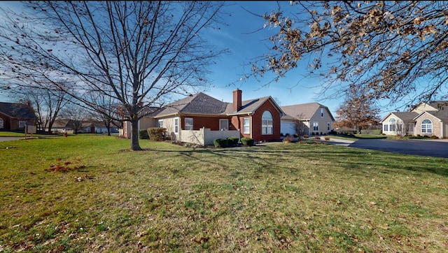 exterior space featuring a front yard