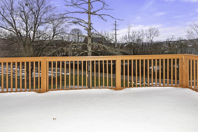 view of snow covered deck