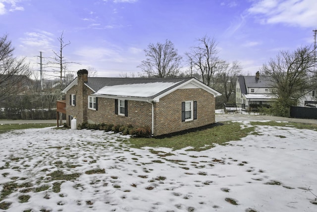 view of snow covered property